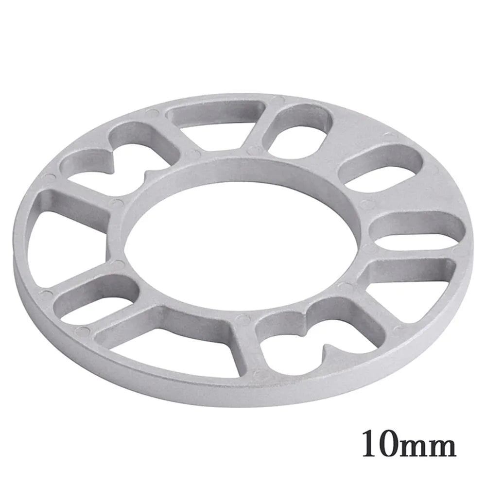 Automotive wheel hub widening gasket spacer in various thicknesses for brake clearance.