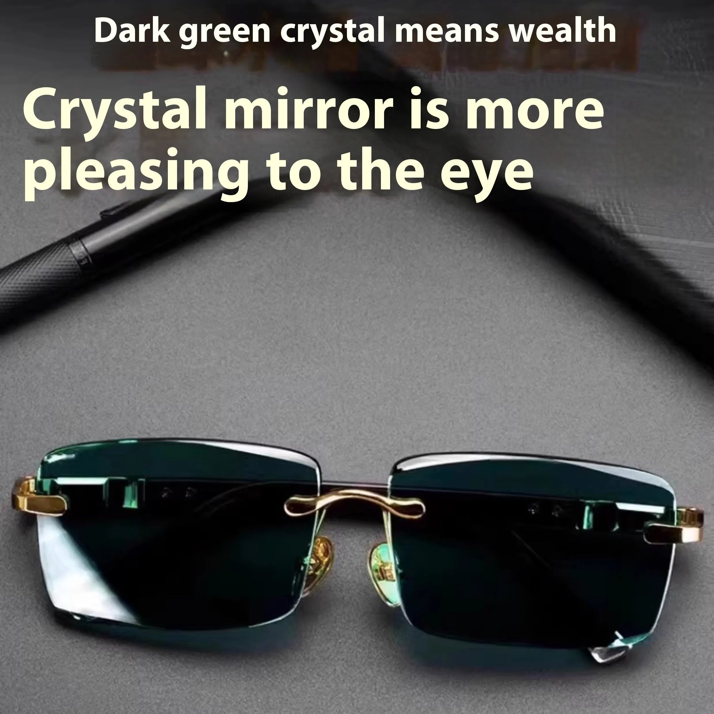 Dark green frameless crystal sunglasses on a case with a lens cloth.