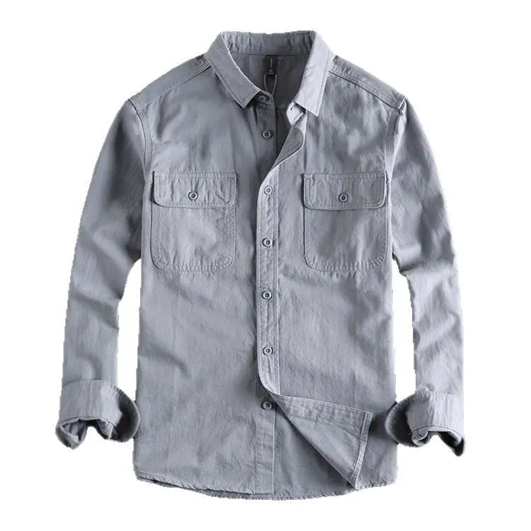 Man wearing a loose fit, long sleeve cardigan-style shirt overall in khaki polyester fabric.