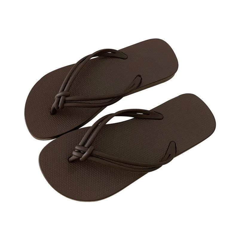 Men's PVC flip flops in a covered toe style on a light background, showing colour options.