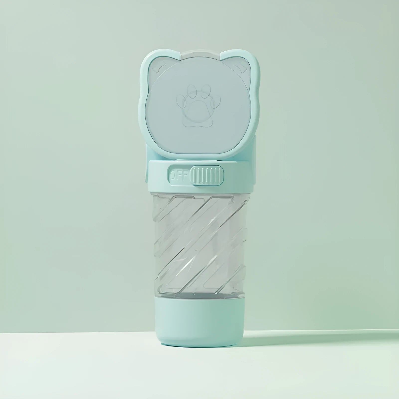 Green, pink, or white 3-in-1 portable pet water bottle with attached strap, food container, and bag dispenser.