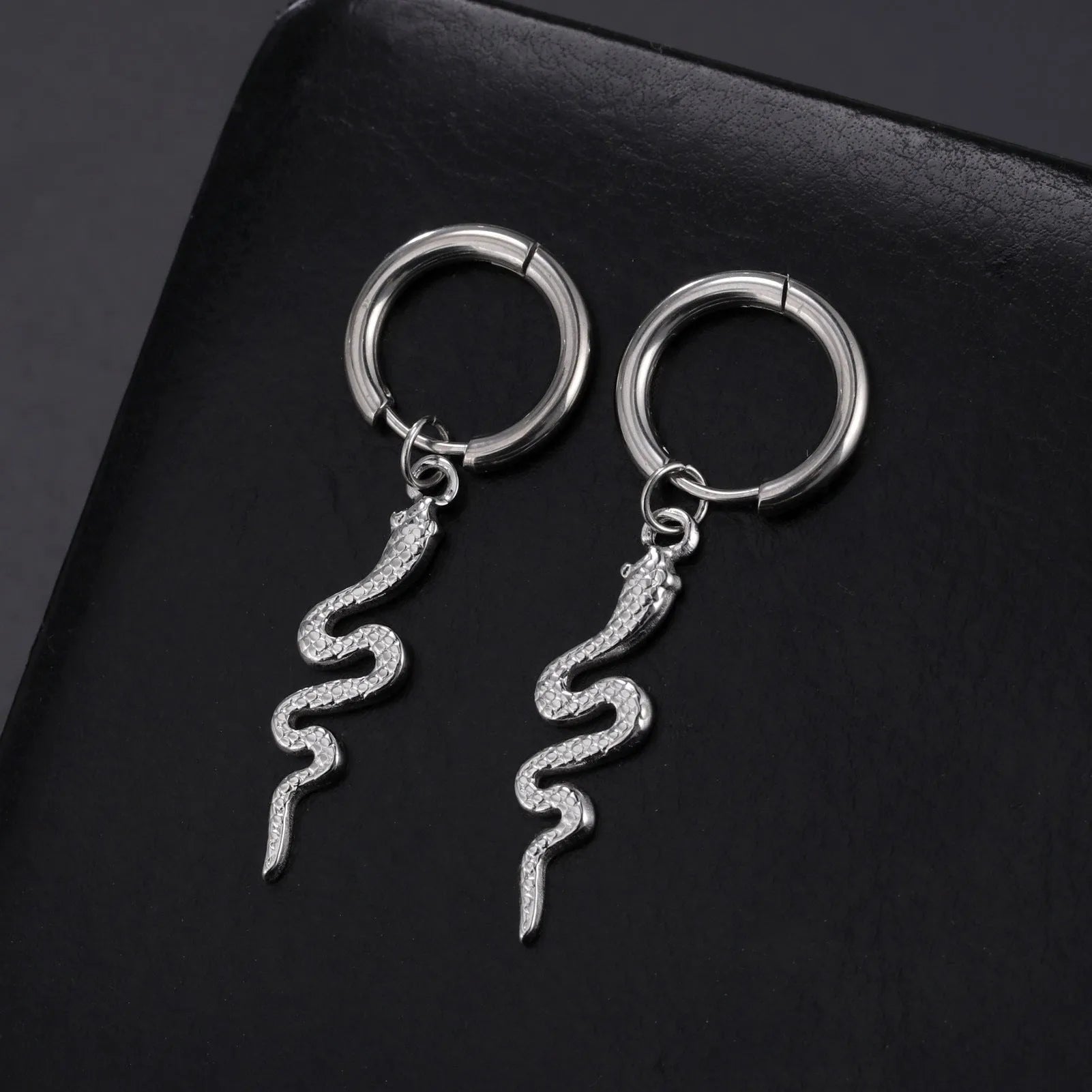 Stainless steel snake-shaped vintage clip earrings with electroplated gold finish and animal zodiac design