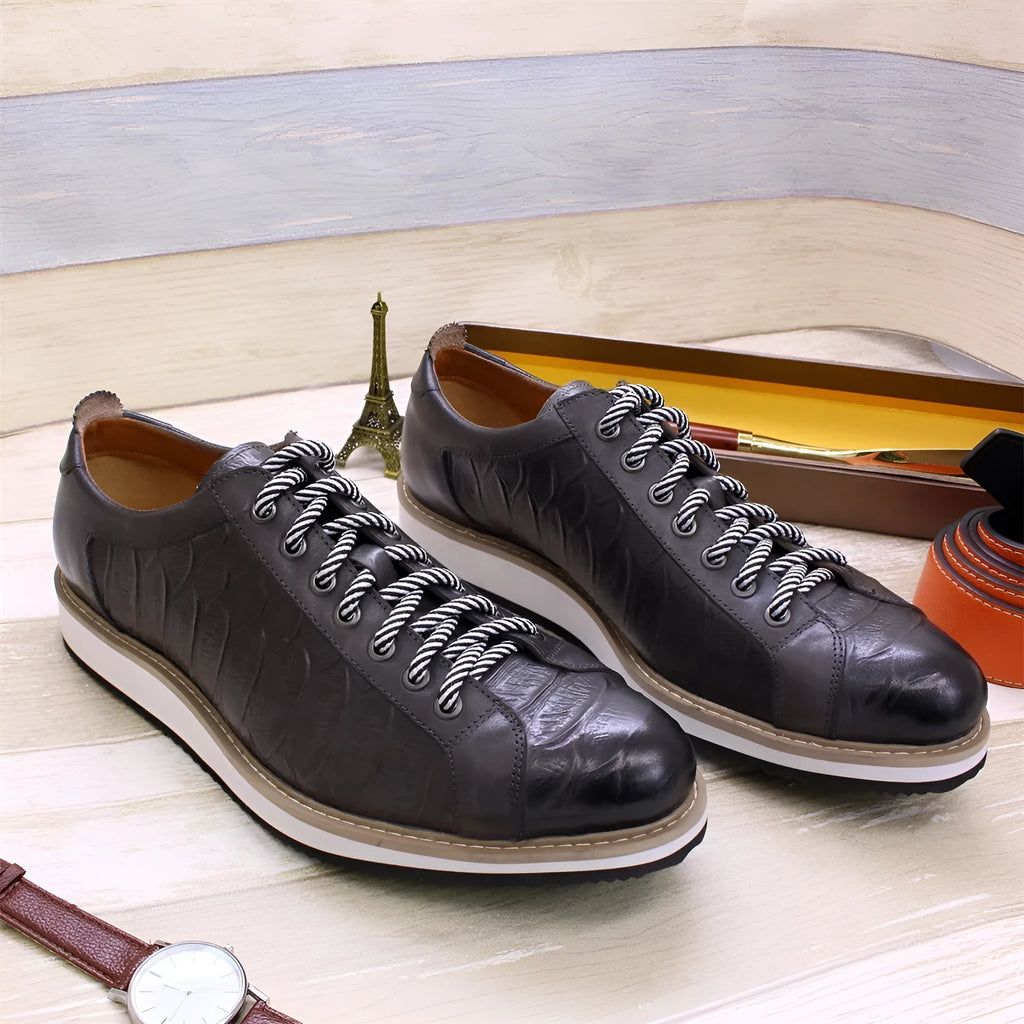 Men's handmade casual shoes with embossed pattern detailing and low tube front tie design