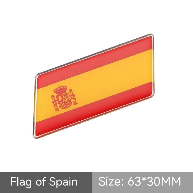 Aluminium parallelogram car sticker with national flag design measuring 6.3 by 3 cm