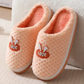 Women's rabbit plaid cotton house slippers with a thick rubber sole, shown in apricot colour.