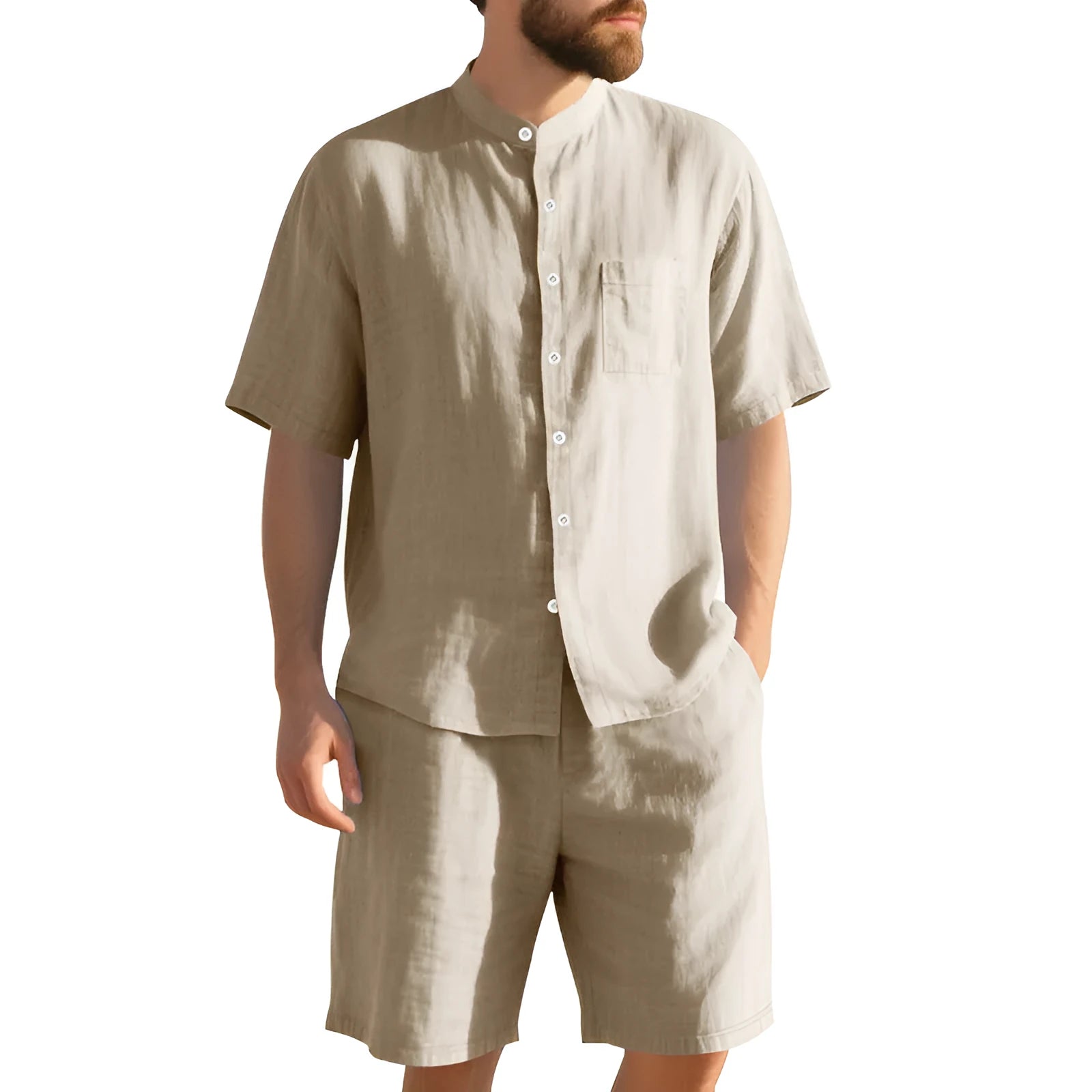 Man wearing a light blue linen blend short sleeve shirt and matching shorts, a casual summer two-piece suit.