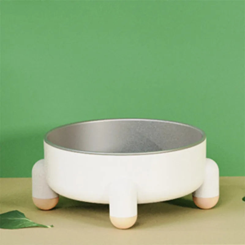Stainless steel pet food bowl with non-slip base in pink, white and green colours