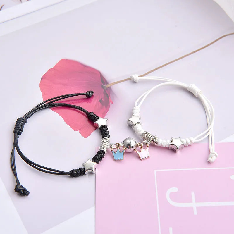 Magnetic couple bracelets with crown design and electroplating finish