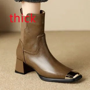 Brown women's cowhide Martin ankle boots with a high heel and side zipper on a white background.