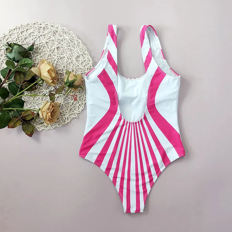 Women's pink striped one-piece swimsuit with digital print on front and back.