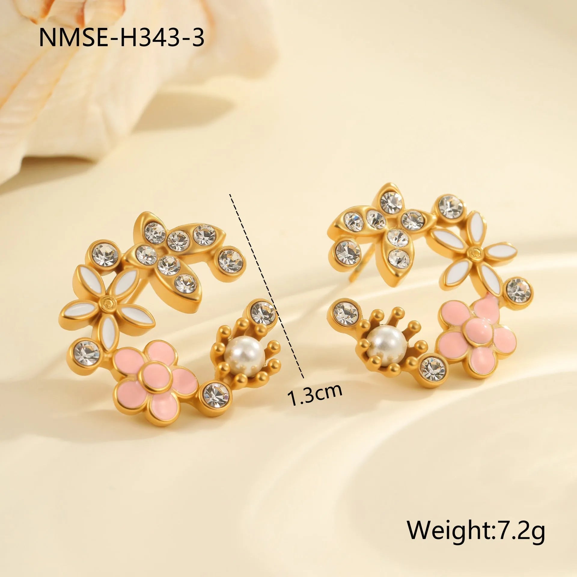 Gold flower stud earrings with petal design on stainless steel backing