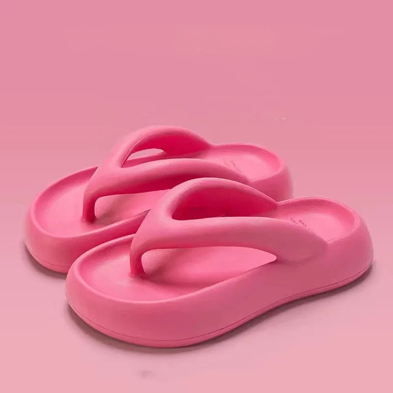 Solid colour EVA thong sandals with thick sole and a bow on the strap.