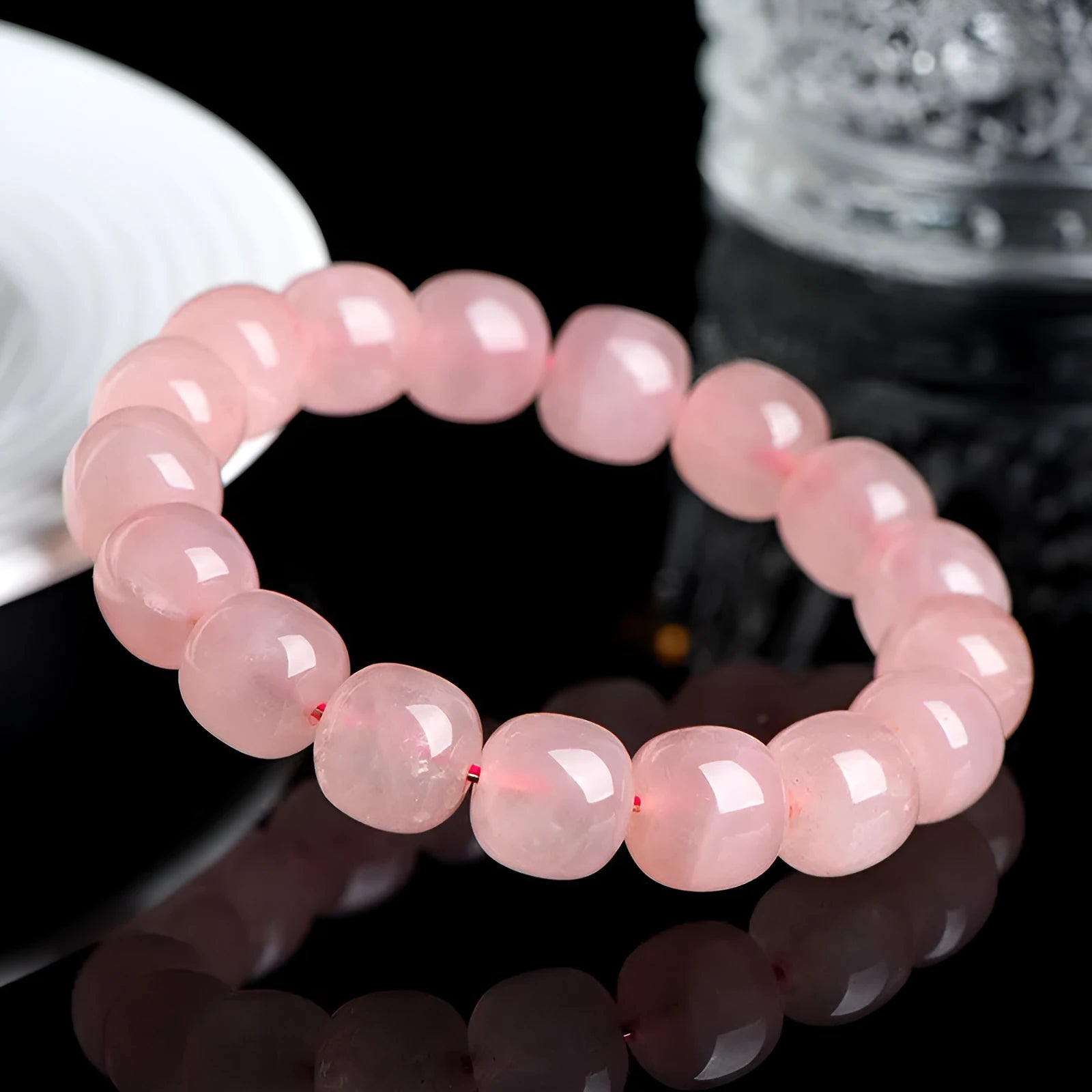 Pink crystal barrel bead bracelet with 8x10mm geometry pattern design