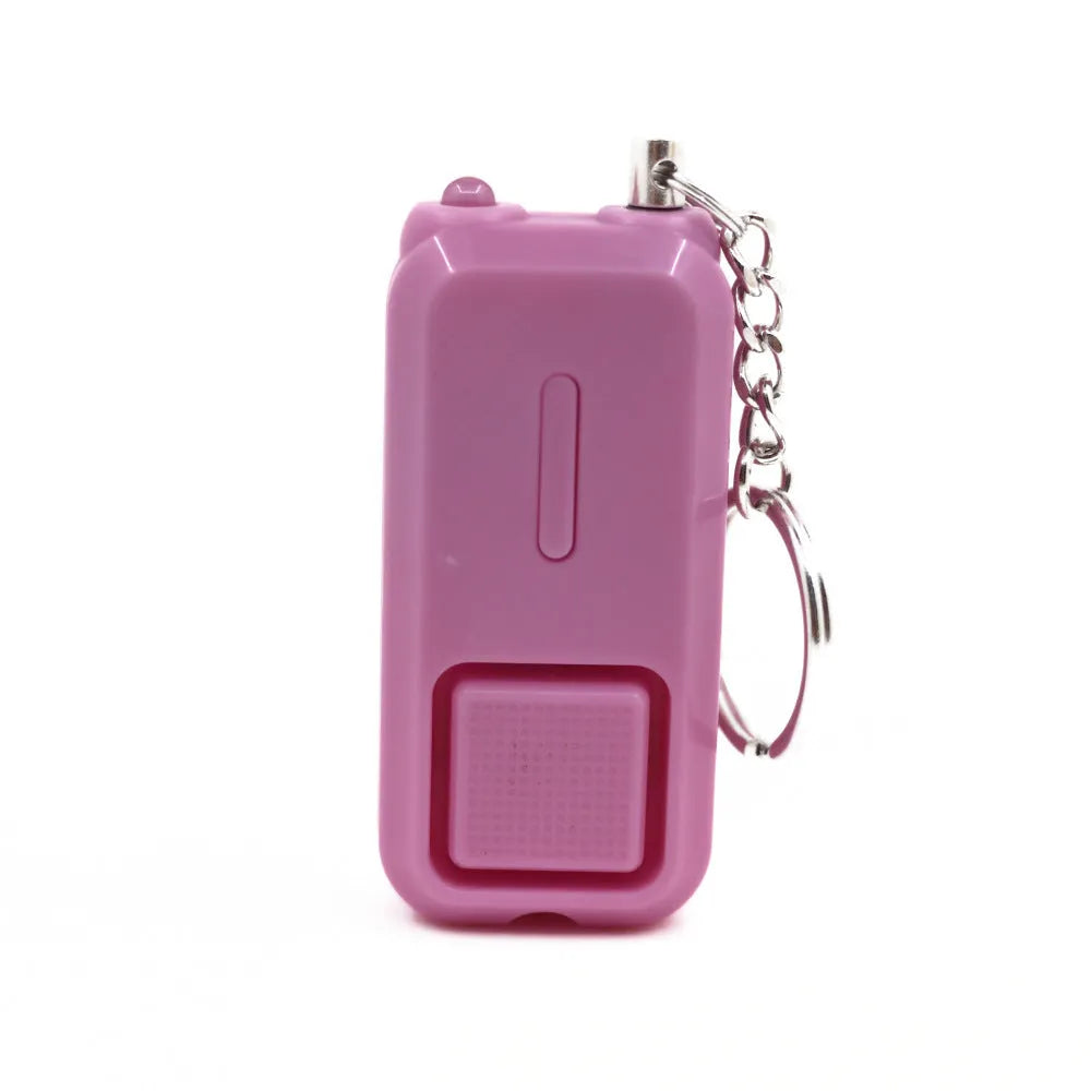 ZQ-202 personal safety alarm in multiple colours showing compact 65x30x12mm dimensions