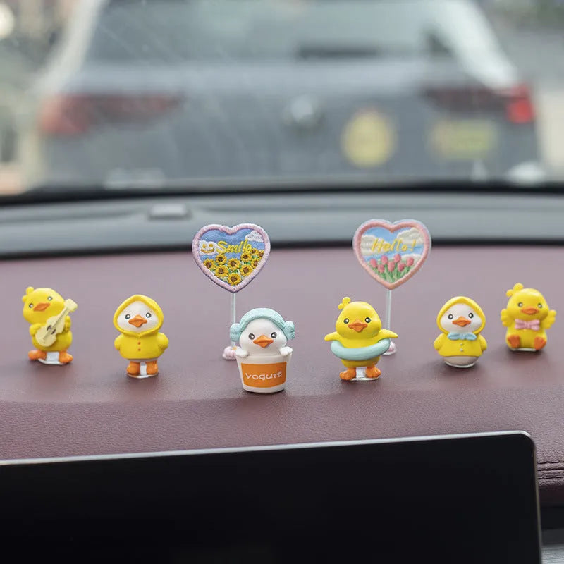 PVC cartoon duckling car decoration set with six ducks and one sign for dashboard or windscreen
