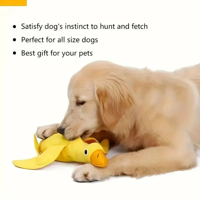 Yellow plush duck dog toy with treat holes and sound module for training and chewing