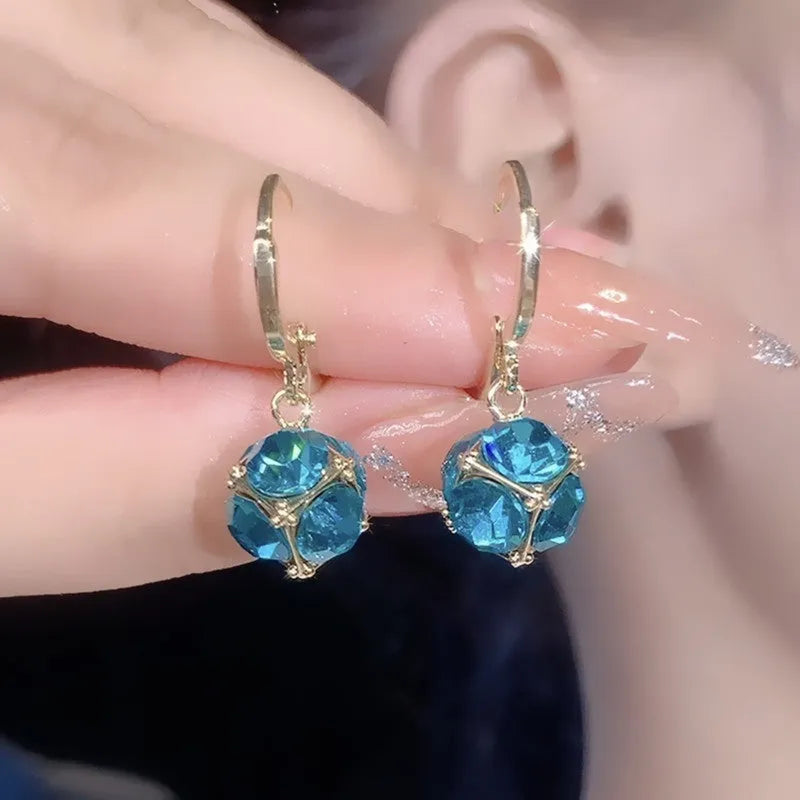 Women's zircon earrings with electroplated finish in geometric rose designs on copper