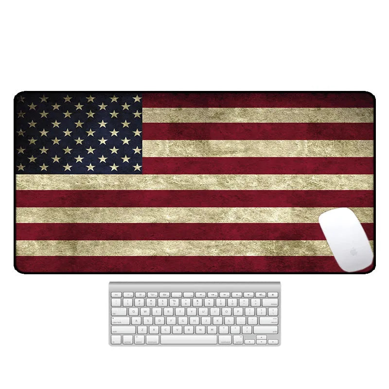 Large rectangular desk pad with printed pattern, natural rubber non-slip base, for computer mouse and keyboard.
