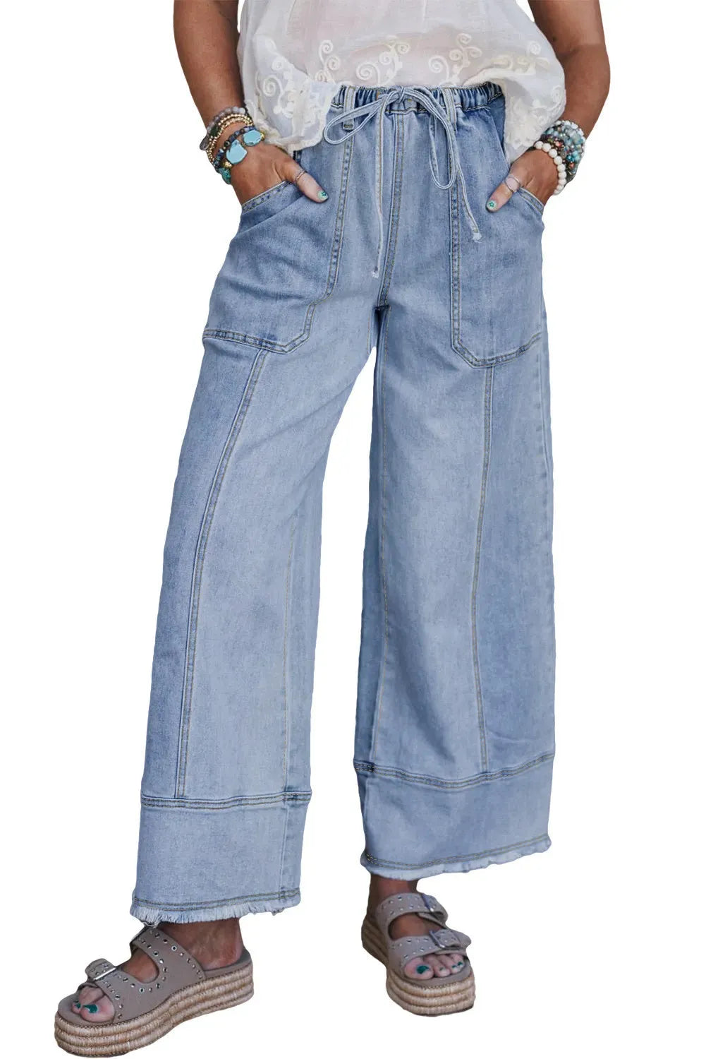 Beau Blue women's wide leg denim pants with drawstring waist and raw hem detailing.