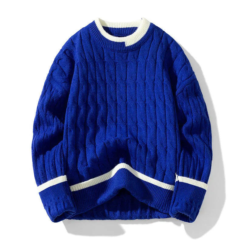 Man wearing a loose-fit long sleeve modal sweater in light blue, part of a two-piece set.