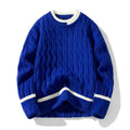 Man wearing a loose-fit long sleeve modal sweater in light blue, part of a two-piece set.