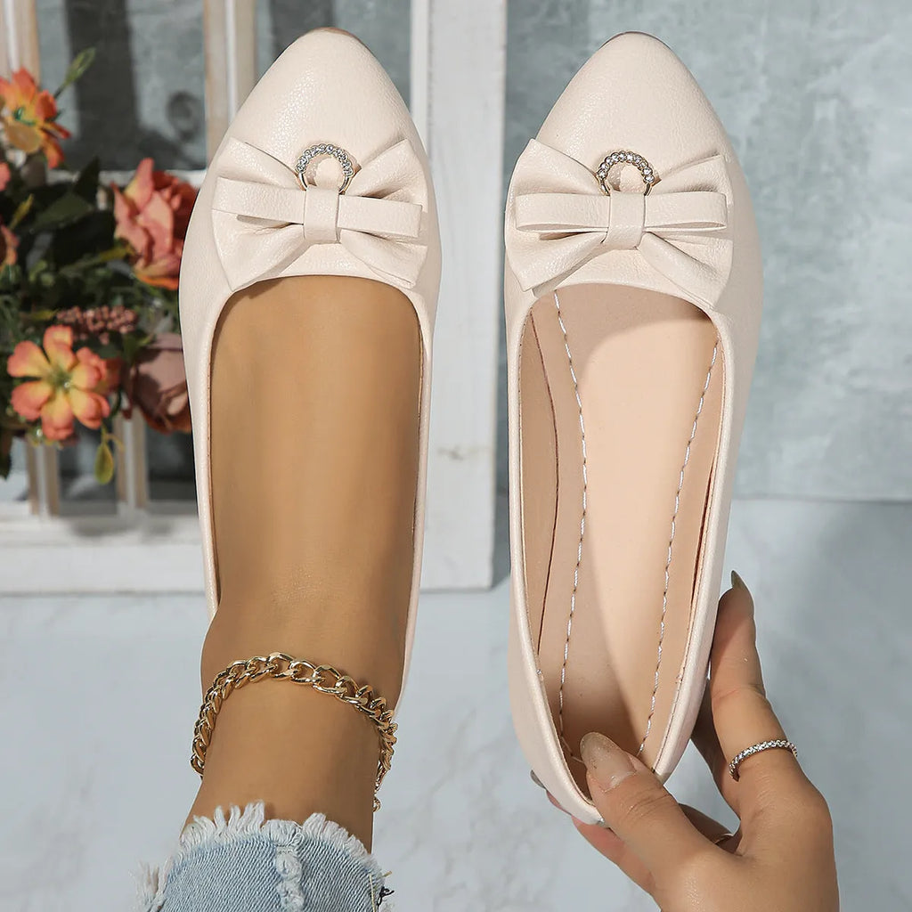 Women's beige flat casual shoes with a bowknot and shallow mouth design on a rubber sole