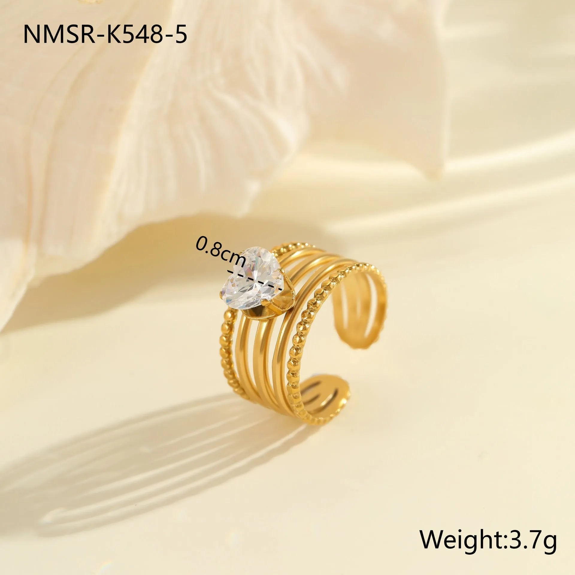 Gold electroplated stainless steel ring with zircon geometric design and open mouth adjustable fit