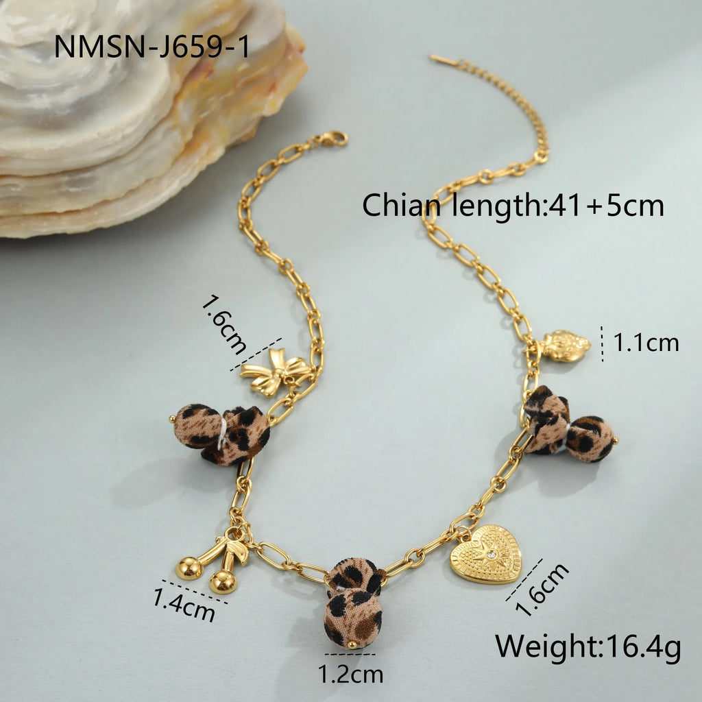 Stainless steel necklace with leopard, heart and flower pendant on adjustable 41-50cm chain
