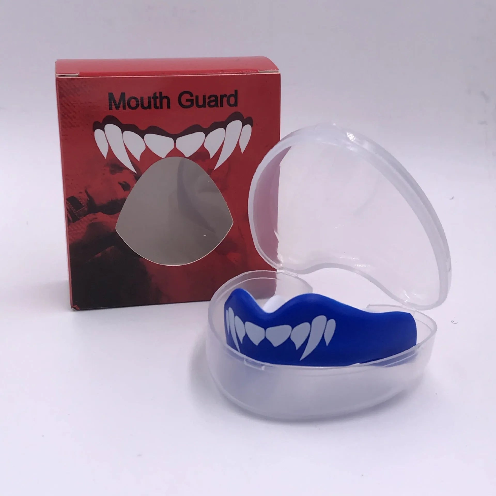 Adult boxing mouthguard with printed teeth design in black and white, for martial arts protection.