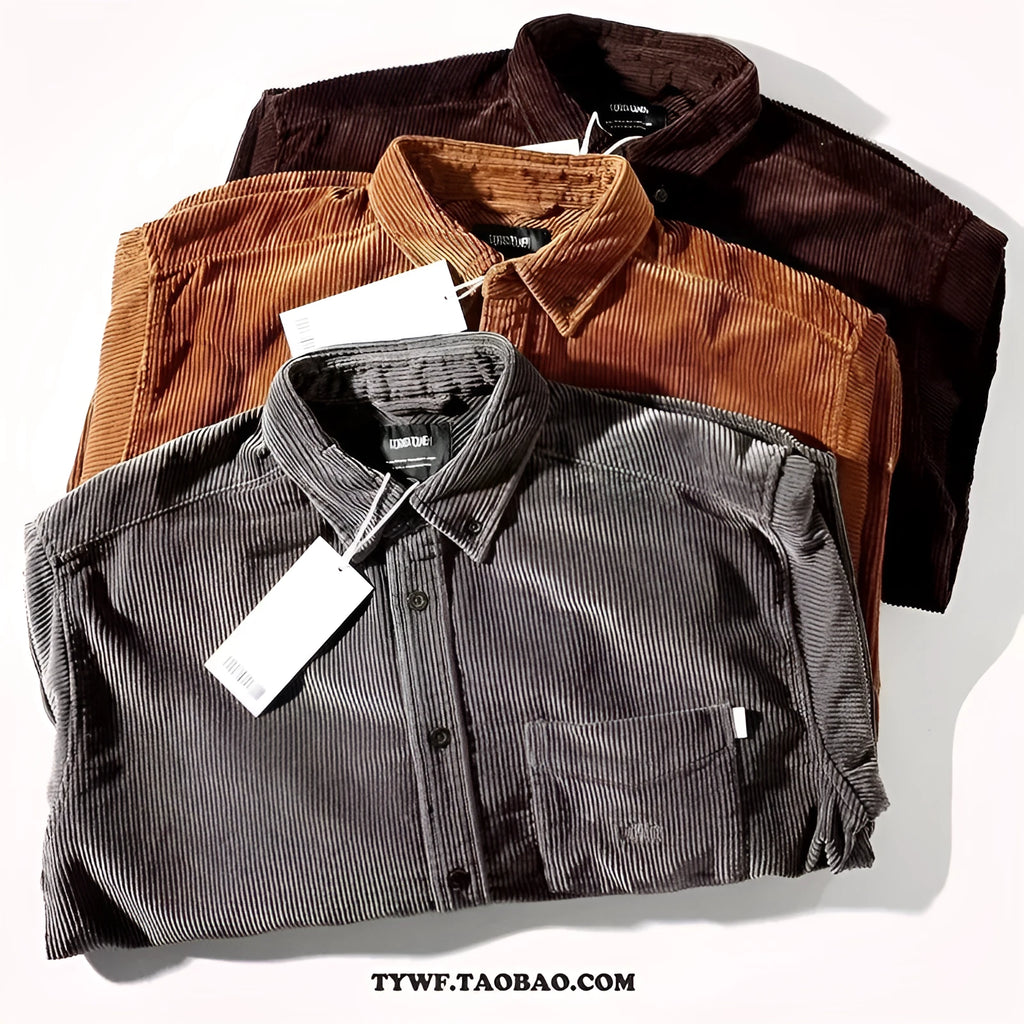 A man wearing a caramel coloured corduroy long sleeve cardigan shirt with a loose fit and button front.