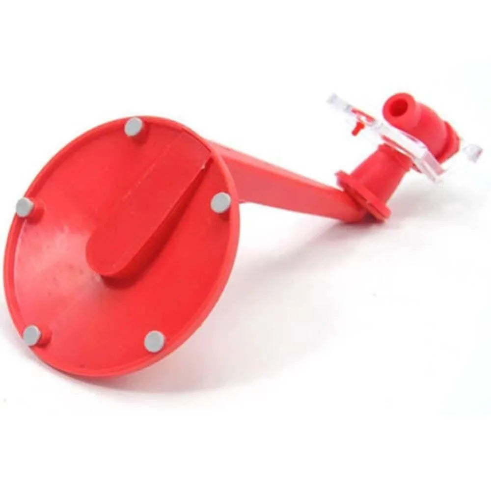 Red plastic soda dispenser attached to inverted 2-litre bottle for push-button drink serving