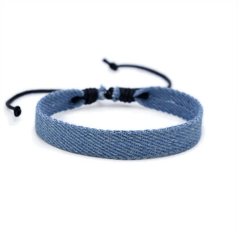 Handmade denim fabric bracelet strap for travel memories, shown in one of eleven colour variants