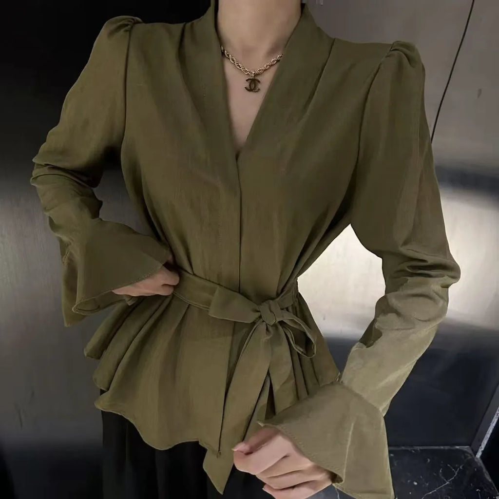 Women's French-style irregular collar long sleeve shirt with bell sleeves and a tie front.