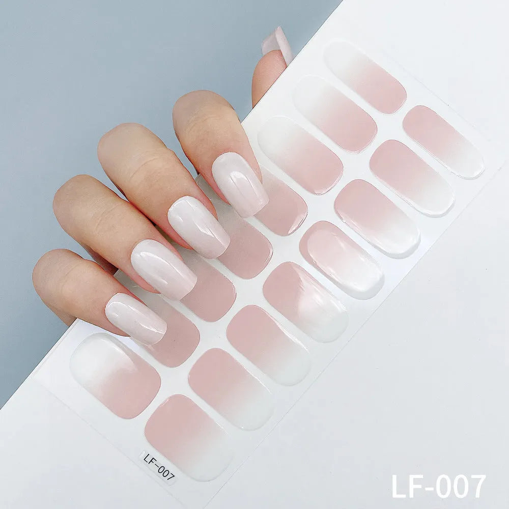 Sheet of 16 solid colour nail art sticker designs including cross, rose, and leopard print patterns.