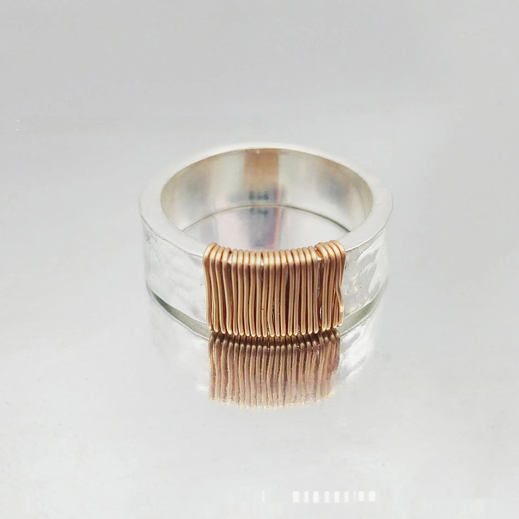 Geometric wide face copper bracelet with irregular coil design in silver golden colour