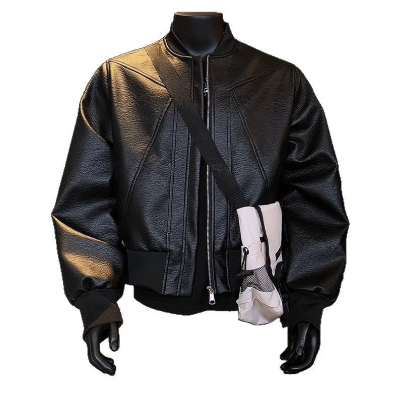 Men's black PU leather jacket with litchi grain texture, showing extended 100cm length and tight fit.