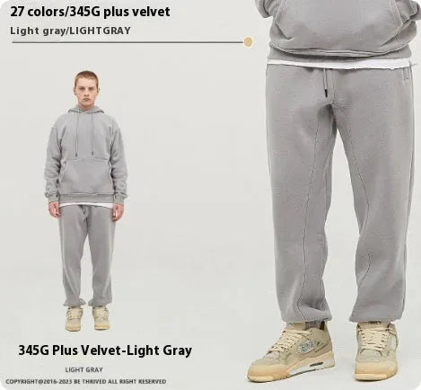 Men's solid colour velvet sweatpants with ankle banding in mid waist design