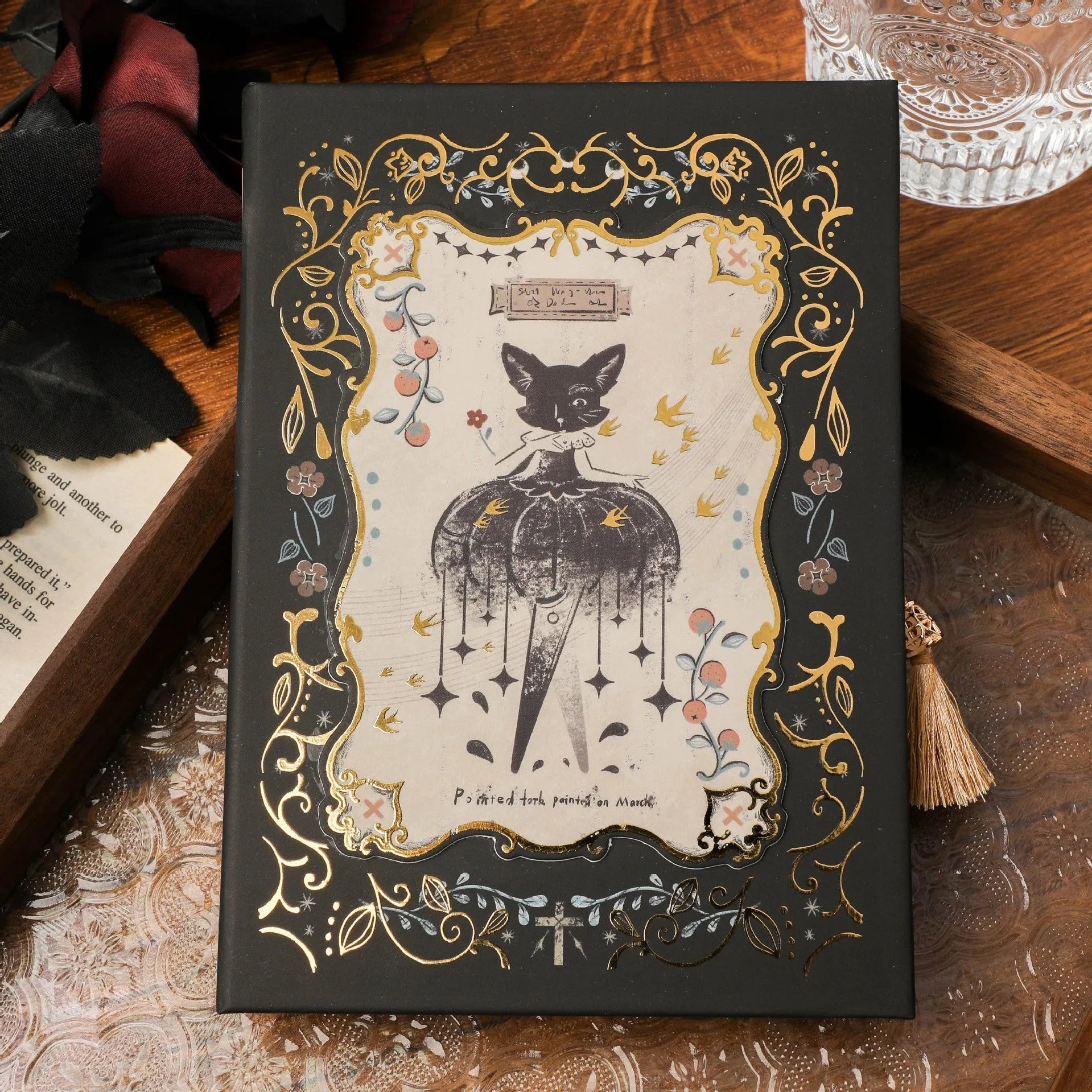 A5 hardcover notebook with gothic retro art cover, open to show 40g wood pulp paper.
