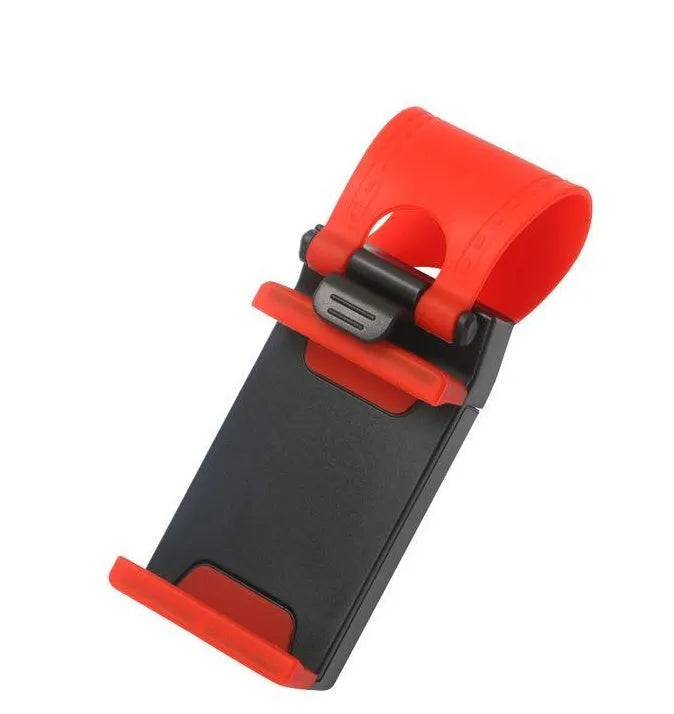 Black steering wheel phone holder clip mounted on car steering wheel holding a smartphone
