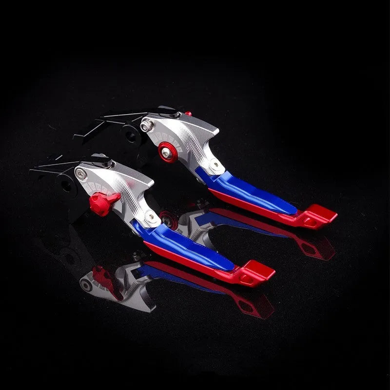 Pair of anodised metal motorcycle brake and clutch levers with adjustable length mechanism