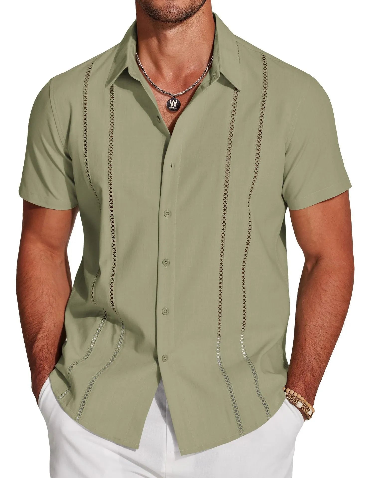 Man wearing a slim fit, short sleeve Hawaiian shirt with a colourful digital print pattern.