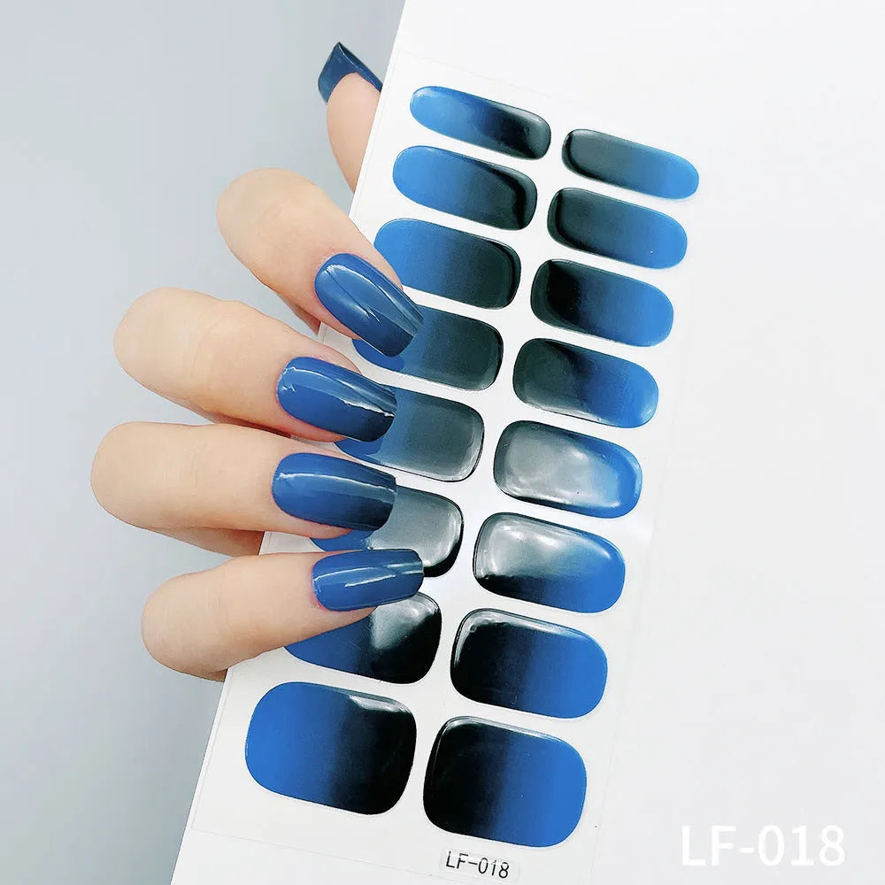 Sheet of 16 solid colour nail art sticker designs including cross, rose, and leopard print patterns.