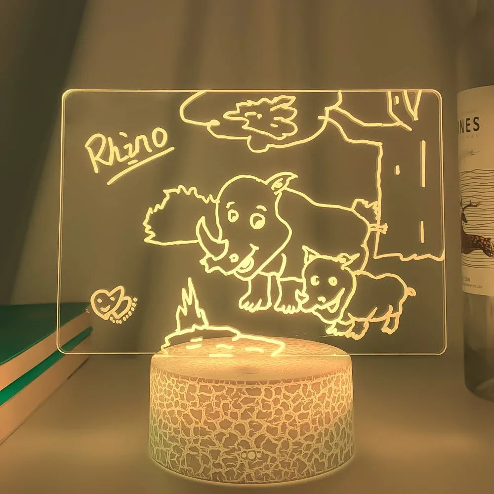 3D acrylic LED message board with stylus pen on illuminated base showing handwritten note