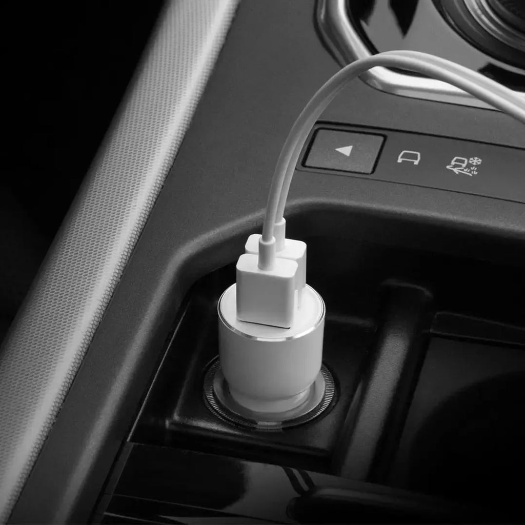 Black Ruimi 3S Music Bluetooth car charger with USB port for phones and tablets.