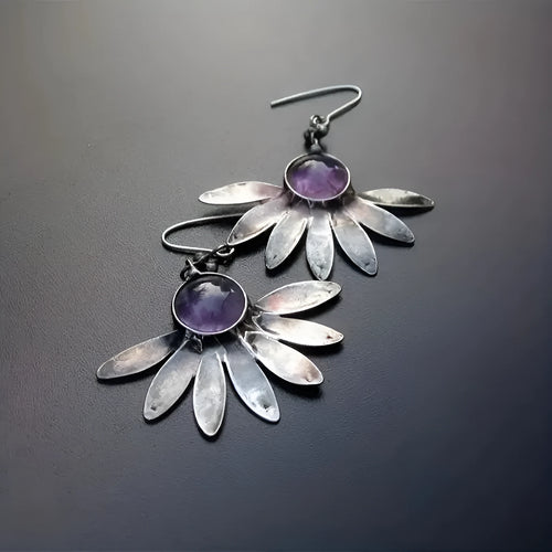 Purple Bohemian style floral earrings with resin gemstone details and zodiac animal modelling in alloy metal