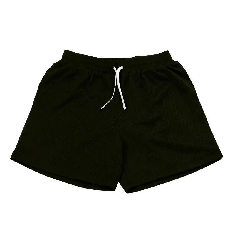 Men's solid colour mesh quick-drying shorts for running and fitness training in summer.