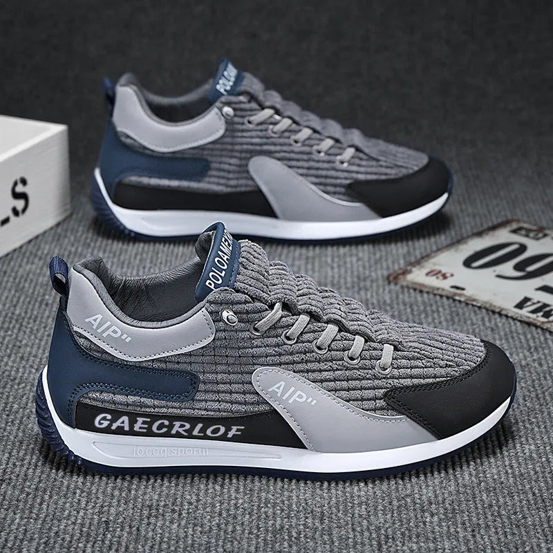 Men's grey mesh running shoes with lace-up closure and round toe design
