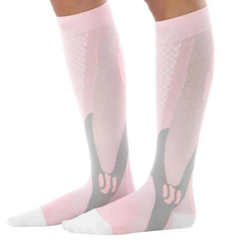 Athletic fit graduated compression socks for men and women in black, shown on a leg.