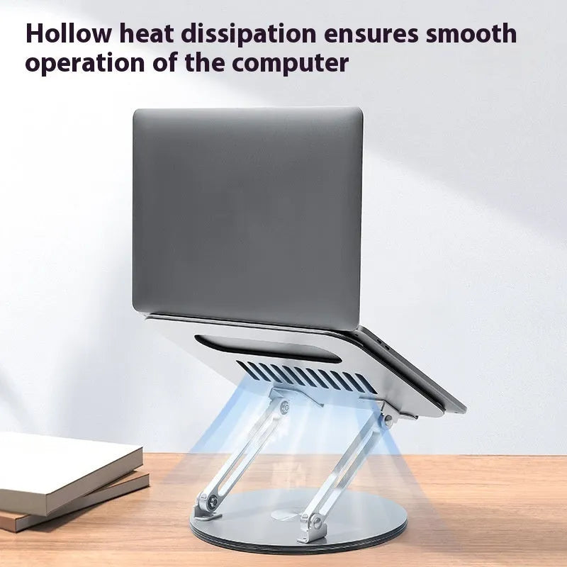 Silver aluminium alloy laptop stand with adjustable height and rotatable design on wooden desk