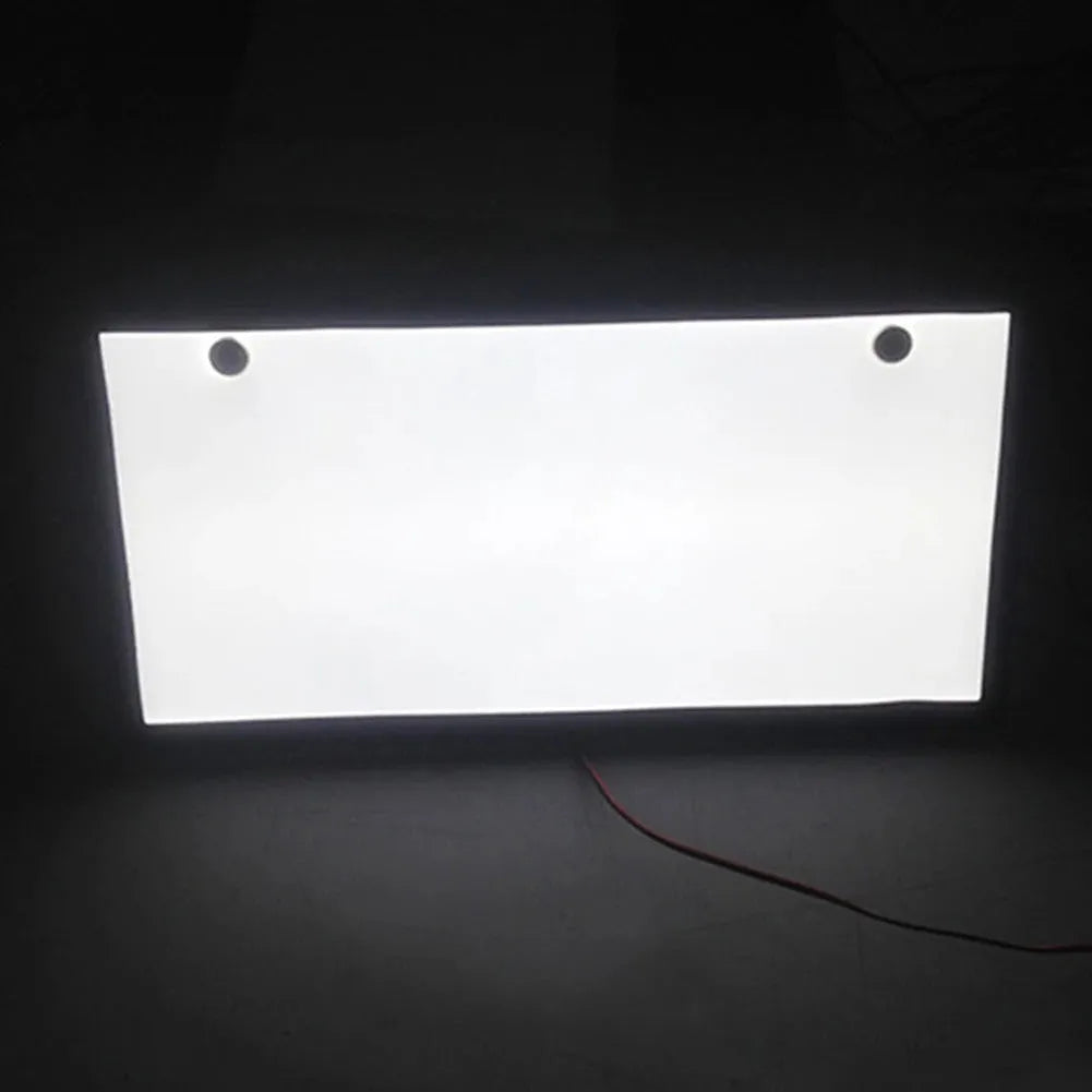 LED truck license plate light set with two clear plastic housings showing uniform illumination
